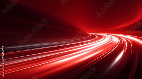 Long exposure light trails of red and white glowing streaks on dark background. High speed motion concept for technology.