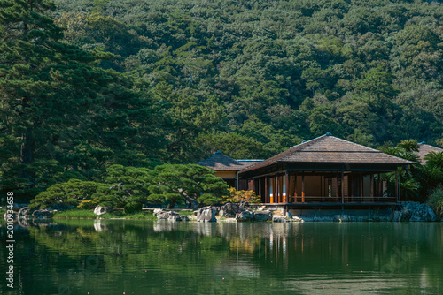 Empty Traditional Japanese tea house and garden with pond reflection in Ritsurin Park, Kagawa