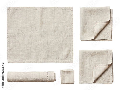 Various natural linen napkins in different folds and arrangements, isolated on a transparent background.
