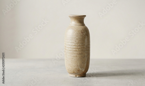 Stoneware pottery vessel photography, minimalist ceramic vase image, artisan handmade clay bottle, neutral home decor accessory, modern speckled stoneware pottery, interior design pottery piece, handm