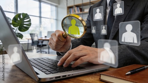 Businessman searching for candidates on laptop digital recruitment HR concept hiring process talent acquisition online job search employee selection corporate headhunting
