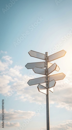 Street signpost with multiple directional arrows against a sky background