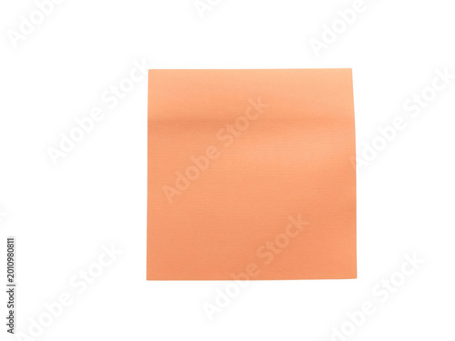Foto Bright orange sticky note on plain surface
