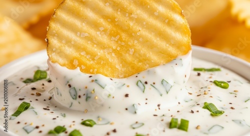 Crispy Ruffled Potato Chip Dipped in Creamy Ranch Dip with Chives.