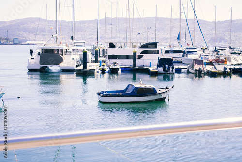 Foto Seaport with boats and yachts in summer, Moaña, Galicia, Spain