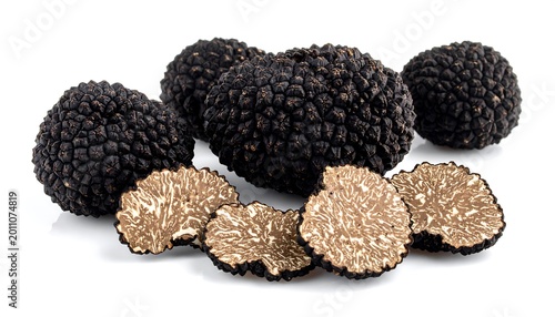 Fresh black truffles gourmet food ingredients on white background