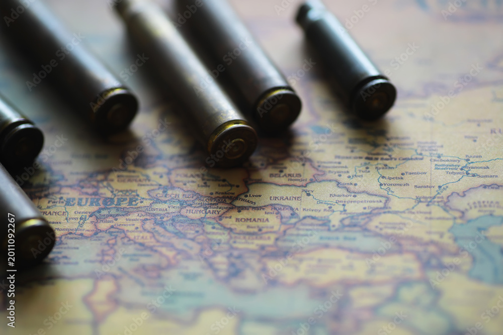 Fototapeta premium Bullets on Europe Map - Concept of Conflict, War, and Geopolitical Tensions