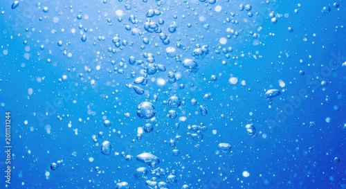 Vibrant blue background with white bubbles rising