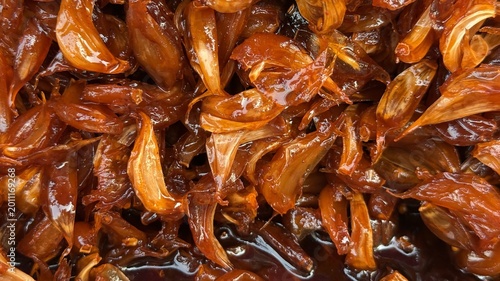 Foto Delicious homemade caramelized garlic cloves prepared as a savory sweet delicacy