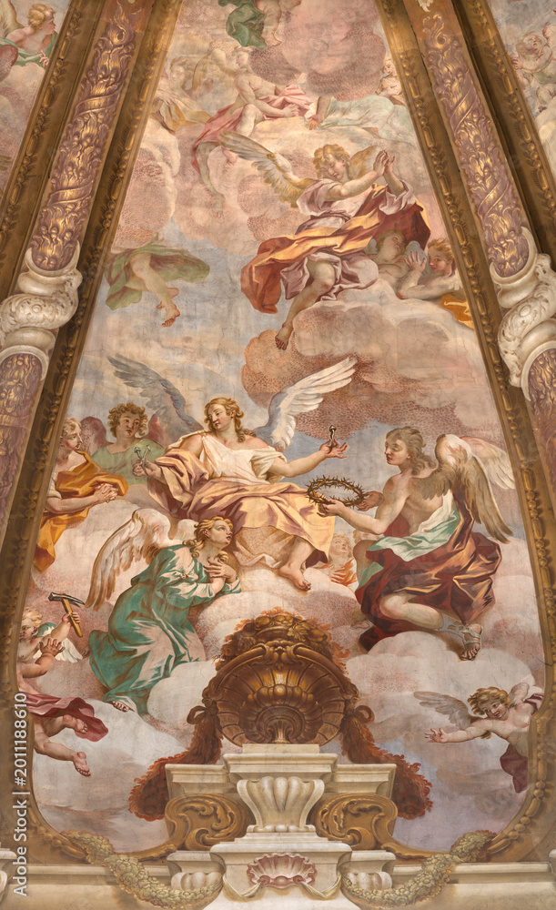 Fototapeta premium CREMA, ITALY - MARCH 20, 2026: The fresco of angels with the Crucifixion instruments (crown, nails,) in cupola of the church Santuario di Santa Maria della Croce by Giacomo Parravicino (1702). 