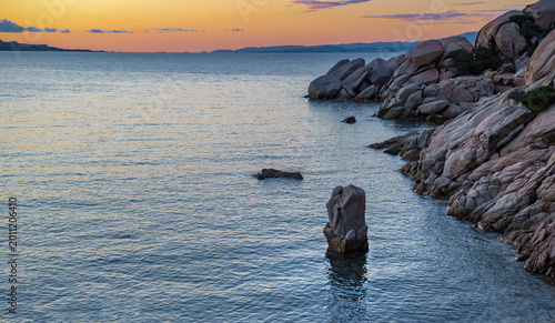 beautiful view at the sunset the granitic rock on the coast at the edge of bl...