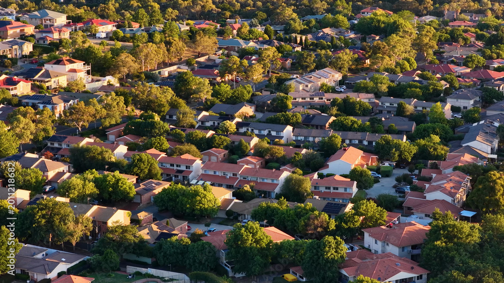 Obraz premium Aerial View of Suburban Houses and Green Trees in Canberra Australia