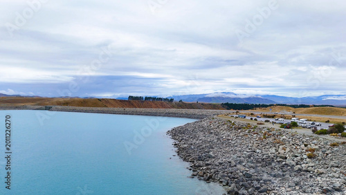 Εκτύπωση καμβά Aerial View of Lake Pukaki Shoreline and Rocky Dam Wall