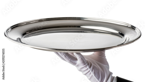 Obraz na płótnie Gloved hand holding polished silver serving tray, isolated on transparent backgr