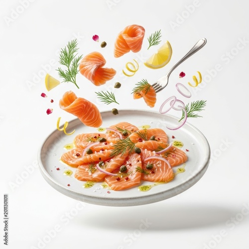 Salmon carpaccio with dill, capers, lemon, and red onion