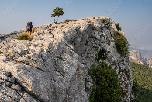 hiker on the three-thousand-mile route (tres mils), Sa Rateta-Na Franquesa-L'Ofre, Natural area of the Serra de Tramuntana., Majorca, Balearic Islands, Spain
