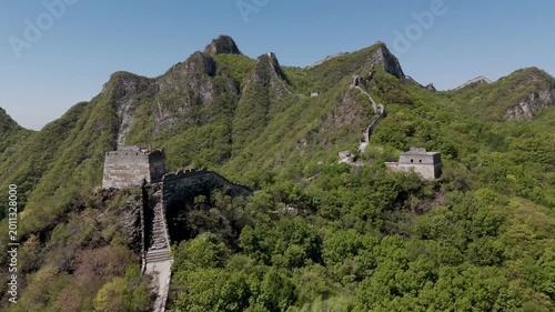 Unrestored Jiankou Great Wall crossing steep mountain peaks and rocky ridges near Beijing, China