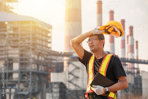 Photos Engineer worker tired fatigue exhausted man working outdoor in hot weather dange