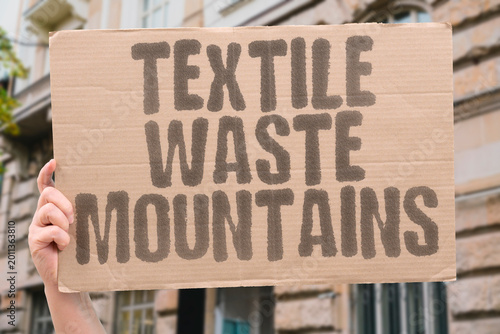 Obraz na plátně "Textile Waste Mountains" Clothing overproduction creates enormous physical waste that ecosystems cannot absorb