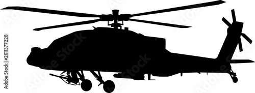 Fotografía Silhouette of an attack helicopter in flight on a white background