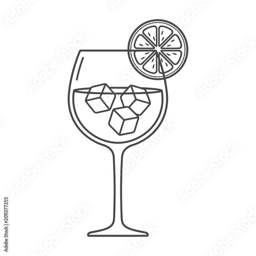 Gin and Tonic Cocktail with Ice Cubes and Lime Slice in Wine Glass