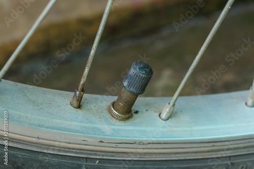 Bicycle pump stand and cap.
