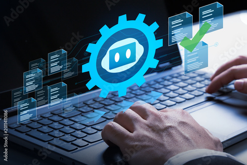 Coding Automation: The image captures a pair of hands focused on coding and operating laptop, with a cogwheel icon, digital information and documents present.