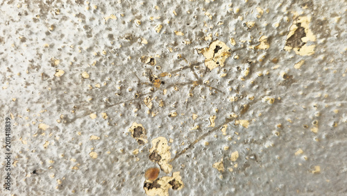 Yellow Popcorn Wall Texture with Scratches and Peeling Paint