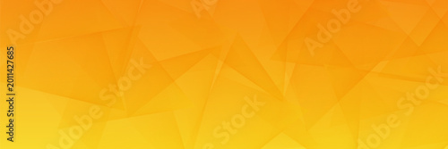 Abstract yellow and orange geometric banner background with dynamic overlapping triangles and vibrant gradient