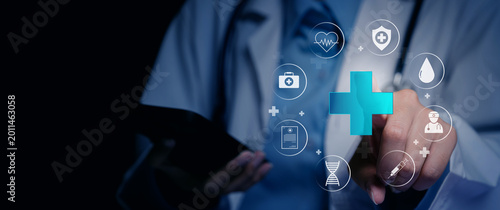 Medical concept. Digital healthcare, doctor using virtual medical interface with health service icons and smartphone, telemedicine and patient care technology concept