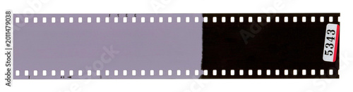 Blank 35mm analog film strip with exposed and unexposed sections isolated on white background