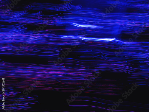 Quadro su tela Abstract blue and magenta light trails with neon motion blur on dark background