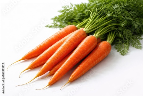 Vibrant carrot root presented on an unblemished white surface