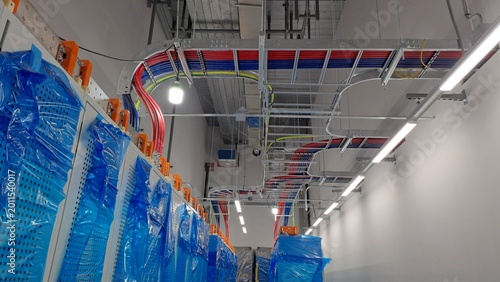 electrical wiring and cable trays in a data center battery room under construction