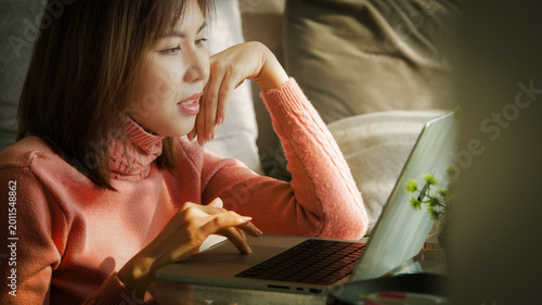 Fotografi Female freelancer joining online video conference from home with modern lifestyl