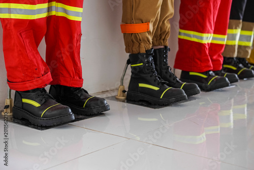 Close up firefighter safety boots on display with copy space, for safety and industrial design