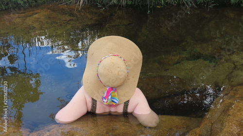 Bild auf Leinwand Woman on the river