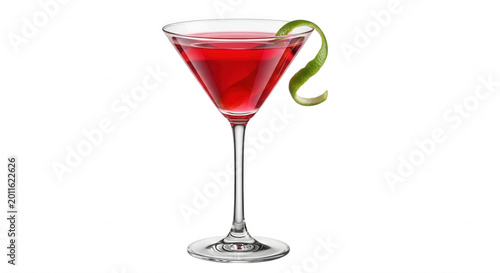 A bright red cosmopolitan cocktail in a clear stemmed martini glass, garnished with a curled green lime twist, isolated on black