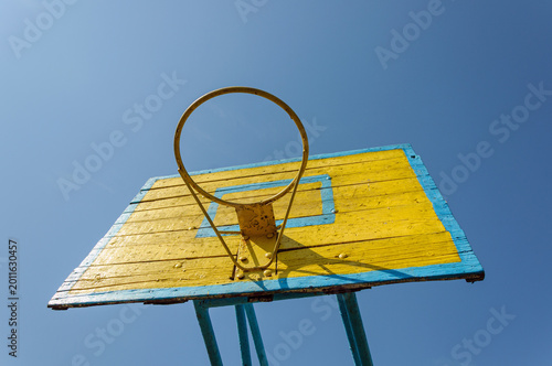 basketball hoop against blue sky