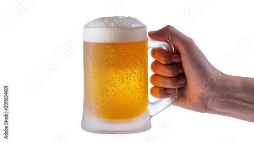 Photos Frothy golden beer in frosted glass held by human hand