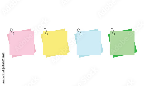 Colorful sticky notes with paper clips arranged in a row, representing reminder, notes, organization, office supplies, and planning on a clean light background.