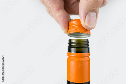 Twist off caps on a wine bottle
