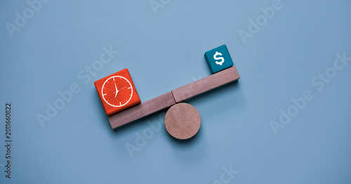 Time versus money concept with balance scale showing clock and dollar symbol blocks, representing productivity, work efficiency, financial management, business strategy and value comparison