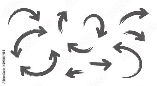 Collection of dark gray brush stroke arrows pointing in various directions
