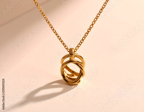 Modern Minimalist Gold: Minimalist gold jewelry display single statement piece on neutral background, elegant pendant showing refined luxury and calm beauty