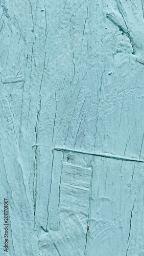 Macro of Cracked and Weathered Light Teal Paint on Wooden Surface — Vertical Stress Lines, Peeling Layers, and Textured Grain Exposure