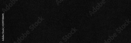 Foto Dark film grain black paper seamless texture background