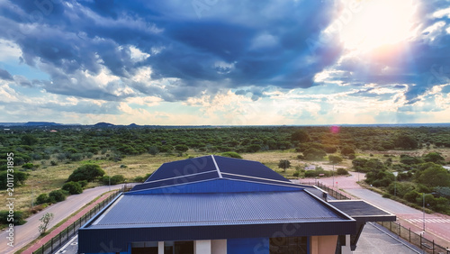 Fotografia High Angle View of Gaborone Industrial Area Building and Natural Landscape