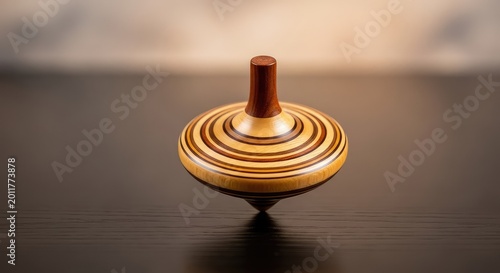 A handcrafted timber spinning top rotates rapidly on a polished surface, showcasing blurred wood grain and elegant craftsmanship in motion, balance, macro, rotation