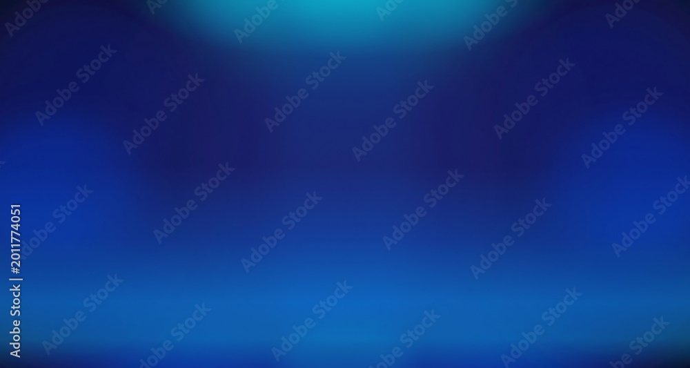 Fototapeta premium A vibrant blue gradient background with a glowing teal light source